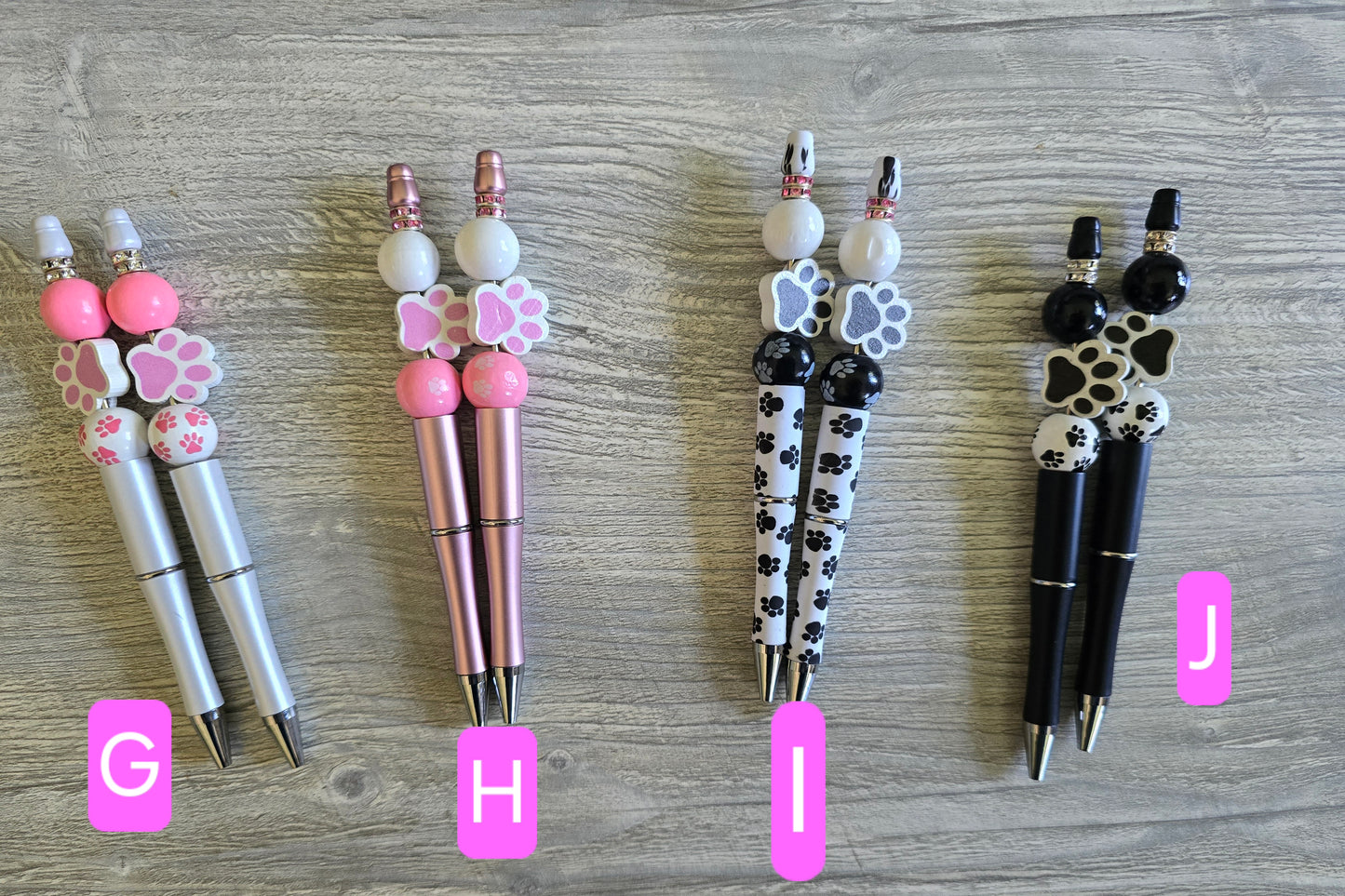 Beaded pens sports and paw