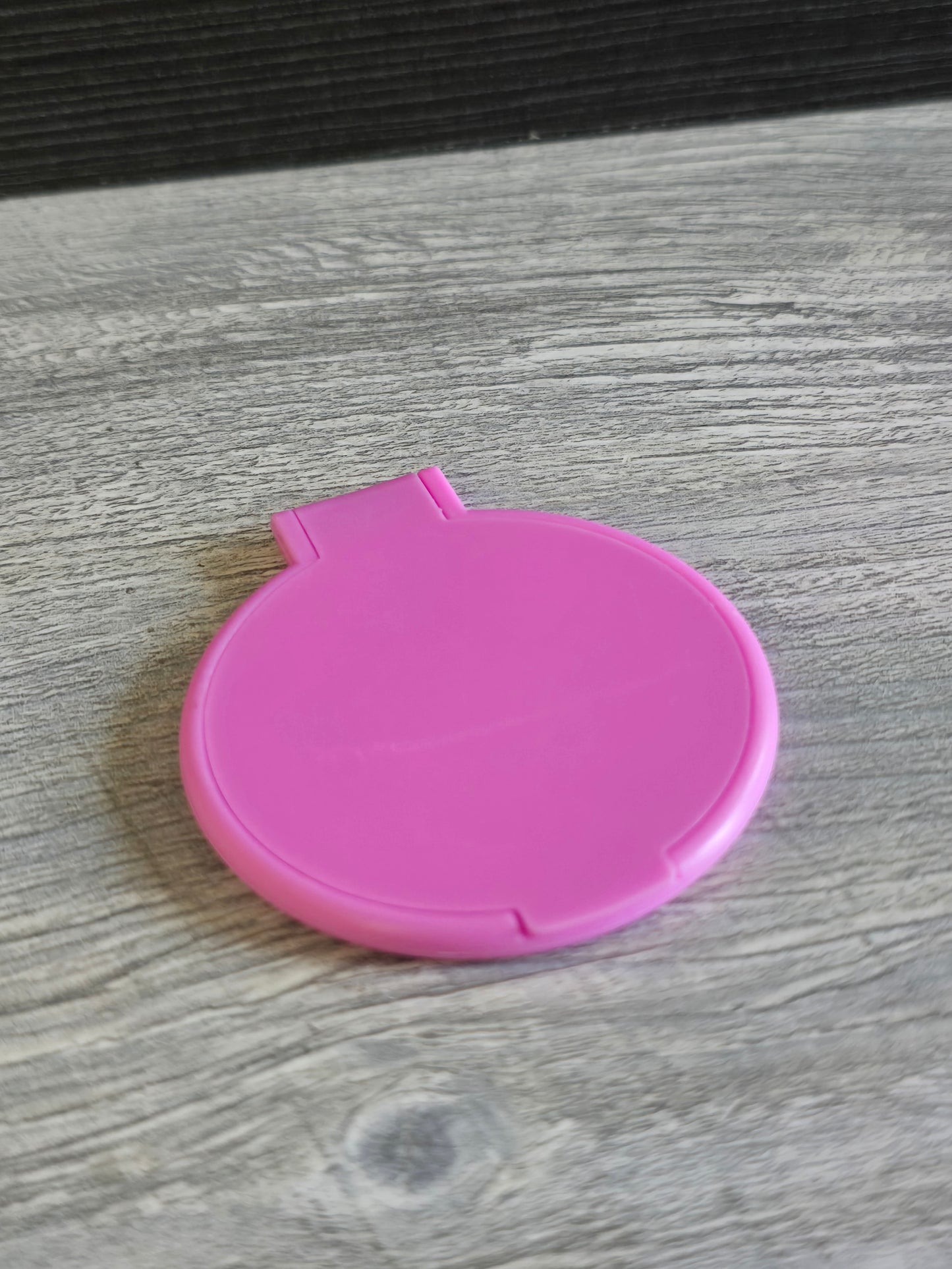 Cheap little plastic mirrors