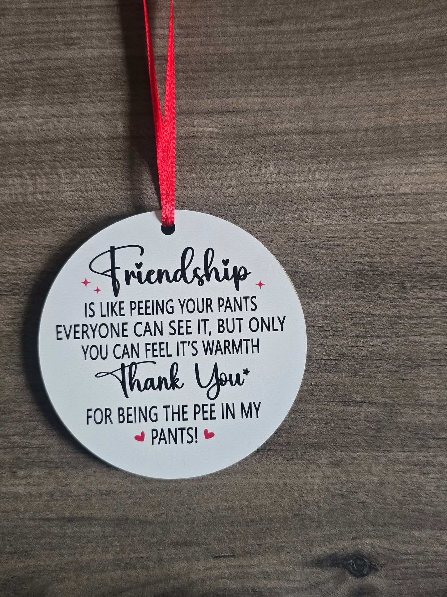 UV printed Friendship is like peeing your pants Christmas Ornament
