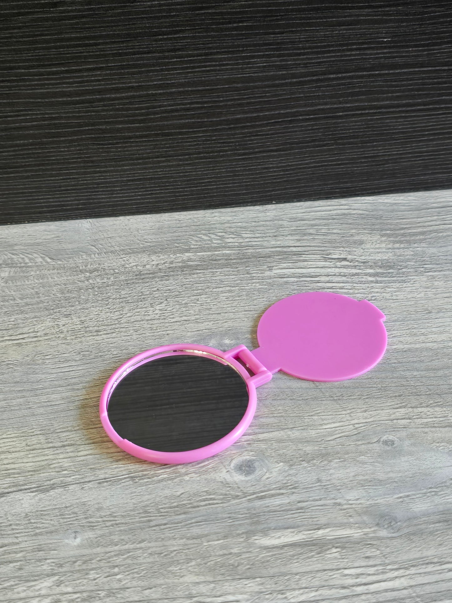 Cheap little plastic mirrors