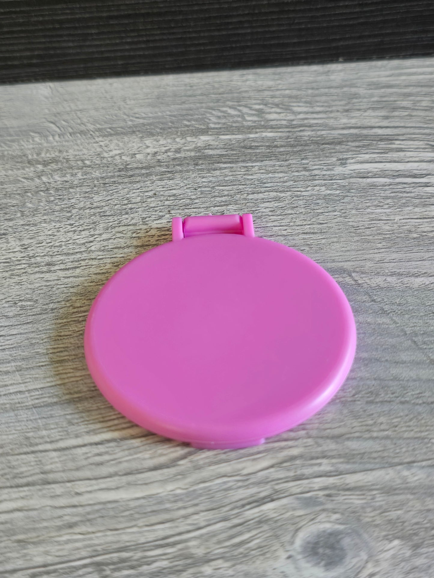 Cheap little plastic mirrors