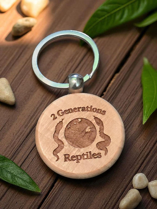 2 generations reptiles round keychains